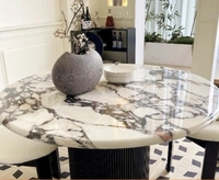 Table à manger en marbre de style crème moderne Plaque inférieure à support complet Conception ronde de haute qualité pour les petits ménages