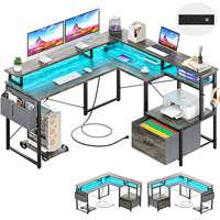 Bureau d'angle moderne en métal en forme de L pour ordinateur et jeux, avec éclairage LED, prise de courant, grande étagère d'angle pour imprimante et tiroir de rangement