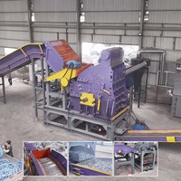 Station de recyclage et de tri des déchets métalliques : vélos, coques de voitures, blocs moteur, roues, acier, aluminium, cadres de vélos