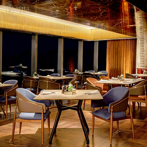 JEILI Conjuntos de Muebles Comerciales para Restaurantes, Silla de Cuero Azul Grisáceo, Mesa Negra con Rieles Dorados, Combo para Hoteles y Restaurantes al Aire Libre - Product Image 1