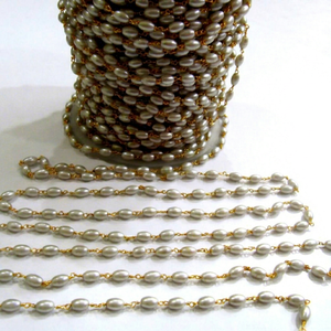 Chaîne de chapelet en perles de riz, perles de Suzani imitation perle 4mmx6mm, vendue au mètre - Product Image 1