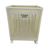 Panier de rangement en plastique avec roulettes et design respirant pour l'organisation du linge