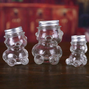 Mini tarros <span class=keywords><strong>de</strong></span> vidrio <span class=keywords><strong>de</strong></span> 50ml con tapa <span class=keywords><strong>de</strong></span> rosca, contenedor <span class=keywords><strong>de</strong></span> vidrio con forma <span class=keywords><strong>de</strong></span> oso con <span class=keywords><strong>corcho</strong></span> <span class=keywords><strong>de</strong></span> madera <span class=keywords><strong>para</strong></span> regalo, artesanía <span class=keywords><strong>de</strong></span> vidrio <span class=keywords><strong>para</strong></span> decoración dulce, venta al por mayor - Product Image 1