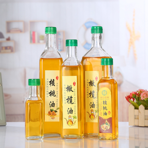 <span class=keywords><strong>Prix</strong></span> usine haute qualité différentes tailles vide huile d'olive récipient d'emballage en verre et bouteille en verre de <span class=keywords><strong>vinaigre</strong></span> avec couvercle vente en vrac - Product Image 1