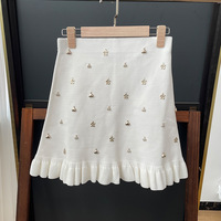 Sandro robe femmes printemps/été français blanc Design dames deux pièces ensemble Sexy sans manches licou gilet avec jupe a-ligne ensemble