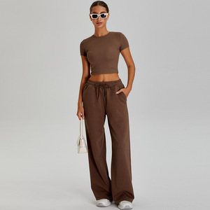 XW-TM0252Y-1 Completo Sportivo da <span class=keywords><strong>Donna</strong></span> per Esterno, T-Shirt Fitness <span class=keywords><strong>a</strong></span> <span class=keywords><strong>Coste</strong></span> e <span class=keywords><strong>Pantaloni</strong></span> Larghi per Yoga e Palestra - Product Image 1