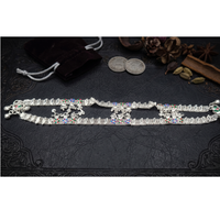 DIVYORO Chaîne de cheville classique en cuivre plaqué argent, ornée de clochettes Jhumka, accessoires féminins haut de gamme pour occasions décontractées et festivals