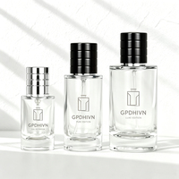 Flacons de parfum vides en verre transparent bleu de luxe avec logo personnalisé, cylindriques, 30 ml, 50 ml, 100 ml, avec vaporisateur à fine brume