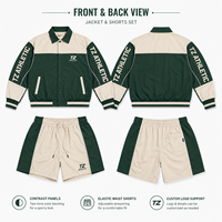 Ensemble de survêtement homme tendance 2026 : Veste et short de coach personnalisés en blocs de couleurs vert forêt et crème, directement de l'usine