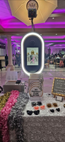 Kiosque photo ovale et cabine photo selfie personnalisable pour iPad et DSLR avec flight case et éclairage RGB pour mariage