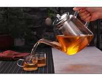 Théière en verre borosilicate soufflé à la main, résistante à la chaleur, personnalisée, 800 ml (27 oz), transparente, avec infuseur pour thé en feuilles.