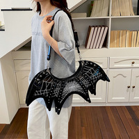 Sac à main chauve-souris au design original, sac à dos asymétrique unisexe, sac sous le bras, produit transfrontalier très demandé