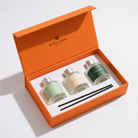 Boîte cadeau de parfum en papier carton velours noir et or avec double porte ouverte de luxe avec logo personnalisé Présentoir de comptoir Sérum d'emballage pour les soins de la peau
