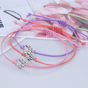Bracelet en cordon ciré tressé avec empreintes de pattes de chat et de chien, accessoire minimaliste et polyvalent pour femme, best-seller - Product Image 3