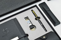 Ensemble cadeau exécutif personnalisé avec logo, carnet en cuir noir de luxe, stylo, porte-clés, porte-cartes de visite