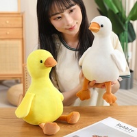 Jouets en peluche en gros : Petits canards jaunes et grandes oies blanches douces, pour la décoration intérieure et les cadeaux d'anniversaire pour enfants
