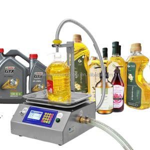 เครื่องบรรจุของเหลวแบบชั่งน้ำหนัก เครื่องบรรจุขวด เหมาะสำหรับไวน์ น้ำมันพืช เครื่องดื่ม ผงซักฟอก แชมพู - Product Image 1