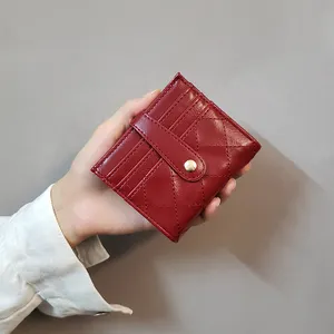 Vente en gros de portefeuille court matelassé mode coréenne pour femmes en cuir huilé mini portefeuille pour étudiants portefeuille à cartes multiples