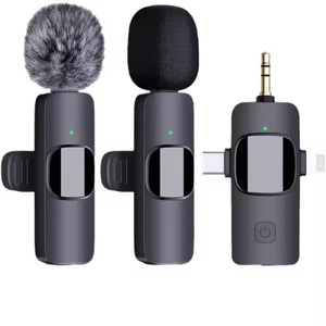 Sistema de Micrófono Inalámbrico K15 Mini con Cancelación de Ruido, Portátil, de Plástico, Compatible con Cámaras DSLR, Videocámaras, Teléfonos y Estudio - Product Image 1