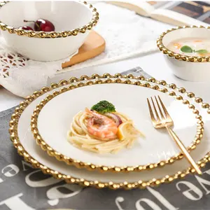 Ensemble de 4 pièces vaisselle en céramique pour la vente en gros d'assiettes à dîner en céramique dorée bol à soupe pour mariage Ensemble d'assiettes à dîner vintage pour la famille