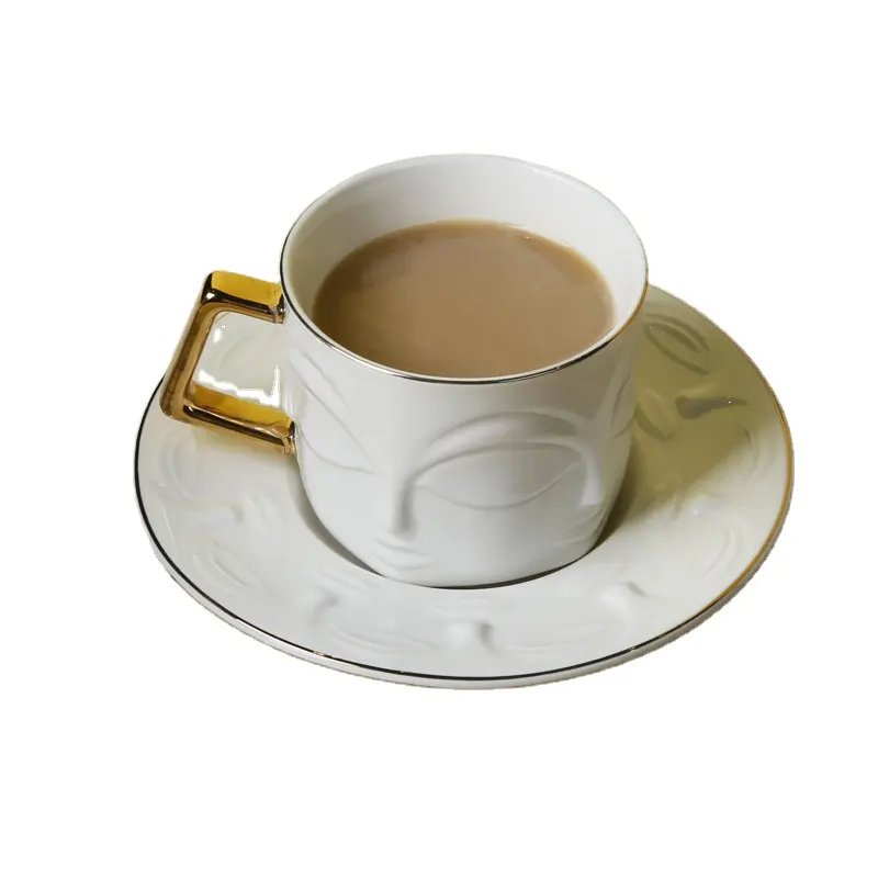 Yüksek kaliteli ince kemik çini kabartmalı kahve fincan ve çay tabağı yüz tasarım fincan tabağı ile beyaz fincan