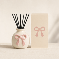Bouteille diffuseur à roseaux en céramique rose personnalisée avec nœud, en porcelaine blanche crémeuse, pour huiles essentielles, flacon décoratif pour arômes et parfums, vente en gros