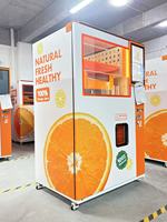 Máquina Expendedora Automática de Zumo de Naranja con Pantalla Táctil de 22 Pulgadas, Múltiples Métodos de Pago (Monedas/QR/Tokens), Autolimpieza y Gestión Basada en la Nube