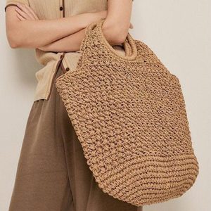 Luxe geometrische trekkoord-tas van stro voor dames - Boho geweven strandtas met uniek trekkoordontwerp, polyester voering, compact - Product Image 3