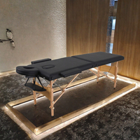 Table de massage portable en bois pliable avec trou pour le visage, idéale pour les spas et salons de beauté - Vente en gros usine