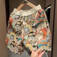 Shorts d'été en polyester imprimé, nouvelle collection haut de gamme, tendance, décontractés, avec cordon de serrage, pour hommes et femmes, élégants, amples, polyvalents, respirants, pour le sport