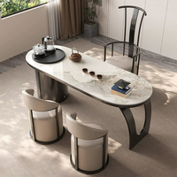 Ensemble de table basse ronde en pierre frittée, table basse avec cadre en acier au carbone courbé et tabourets rembourrés pour salon et réception