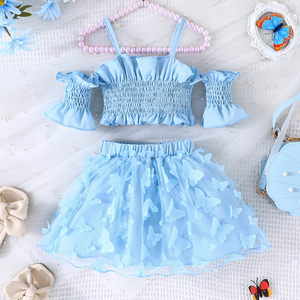 Conjunto de Dos Piezas para Niñas al por Mayor: Top Corto de Tirantes a la Moda y Falda de Malla Bordada con Diseño de Lazos y Cordón Ajustable de Lana - Product Image 1