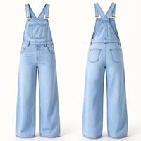 Salopette large bleu clair aérien avec boutons latéraux métalliques – Idéale pour les journées à la plage et les balades en bord de mer