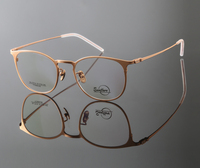 Lunettes en titane haut de gamme pour femmes, monture optique rétro ronde punk pour hommes, No quantité minimale de commande