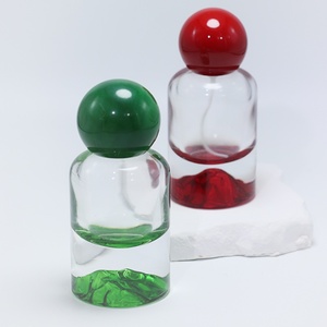 Bouteilles de parfum cylindriques en verre OEM/ODM 30ml 50ml 100ml avec fonds sérigraphiés or/argent/bleu/rouge/vert et pulvérisateur à pompe pour cadeau - Product Image 3