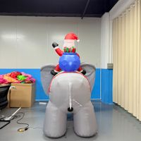 Figurine gonflable de Noël pour décoration de jardin extérieur : Vieil homme montant sur un éléphant – Idéale pour les expositions commerciales internationales