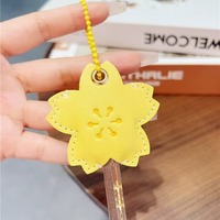 Étui de protection pour clés en cuir PU élégant, en forme de fleur, écologique, de haute qualité, couleur personnalisée, sac de rangement portable, porte-clés