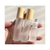 Petit flacon roll-on portable en verre ambré de 3 ml, 5 ml, 10 ml avec bouchon en bois et bille métallique pour parfum, flacon roll-on de 5 ml