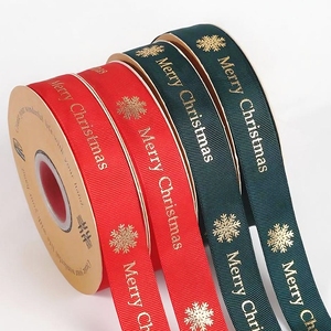 Populair 2025 Vrolijk Kerstlint Goud Reliëf Bedrukt Grosgrain Lint Rol 25Mm Aangepast Logo Bedrukt Voor Nieuwjaar - Product Image 1