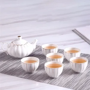 Mini juego de tazas de té de cerámica de lujo, juego de tazas de té blanco dorado, Occidental, para boda, nuevo diseño, 8 Uds.