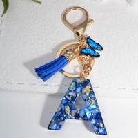 Porte-clés porte-clés mignon en résine avec lettres initiales de l'alphabet pour femmes et filles Porte-clés sac à dos avec pendentif suspendu pour voiture
