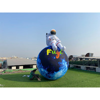 Sculpture d'astronaute gonflable géante Fuyi personnalisée avec souffleur d'air pour centre commercial, fête, événement thématique, décoration commerciale