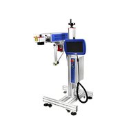 Autofocus en ligne volant 30W co2 galvo laser machine de marquage avec convoyeur pour jeans carte d'identité câble oiseau anneau stylo gravure sur bois