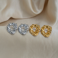 Boucles d'oreilles clous X&L en acier inoxydable étanche plaqué or 18 carats, motif cercle creux, bijoux de charme populaires pour femmes, mode quotidienne