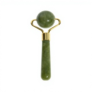 Rodillo Facial de Jade Natural Ecológico con Marco Dorado para el Cuidado de la Piel y Belleza - Product Image 1