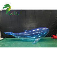 Modèle gonflable publicitaire en forme de dauphin, décoratif, transparent bleu en PVC, pour fêtes LED 2026