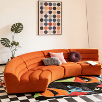 Canapé modulaire incurvé moderne en velours orange avec capitonnage cannelé pour salon