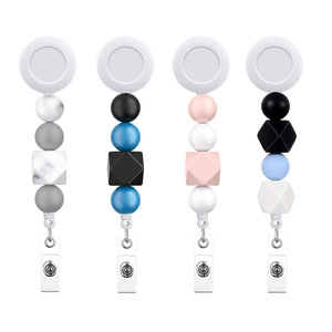 Venta al por mayor: Nuevo estilo 2026, carrete retráctil de plástico con clip para credenciales, soporte para tarjetas de identificación, accesorios para enfermeras. - Product Image 1