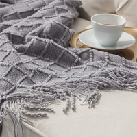 Vente en gros de couvertures décoratives en tricot à franges 100% acrylique texturé uni pour la maison, chaise, canapé, lit