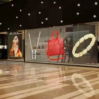 Affichage LED transparent intérieur pour fenêtre murale et vitrée Publicité avec vidéo LED transparente et affichage LED maillé
